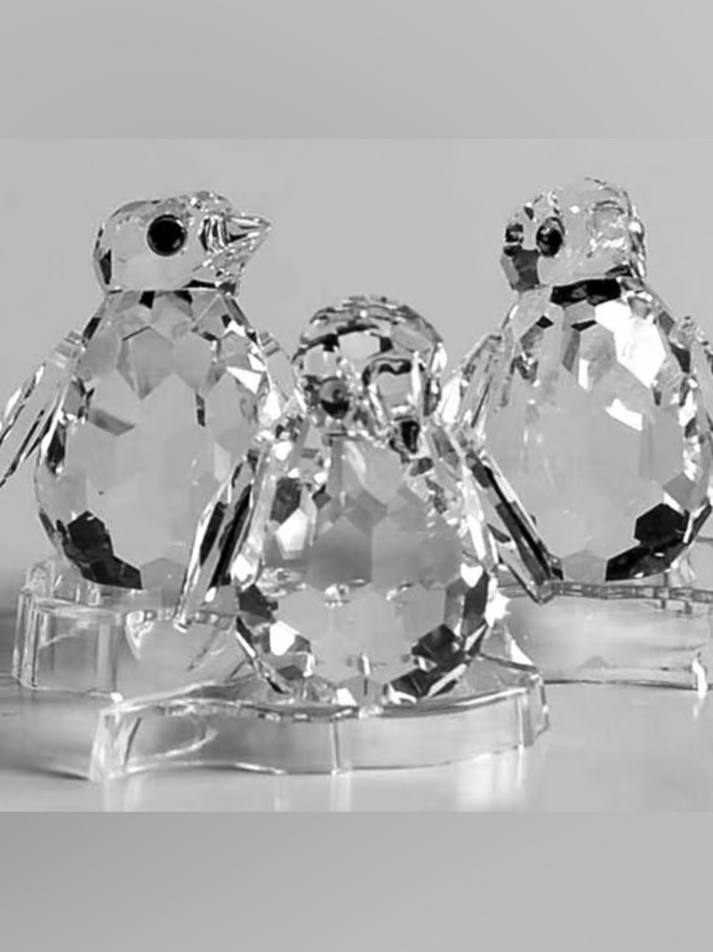 Swarovski baby penguins figurine set